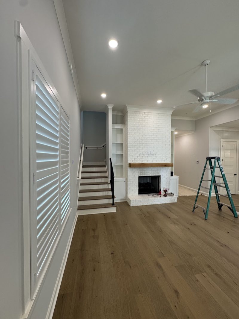 Interior painting project by Mas Painting showing white brick fireplace